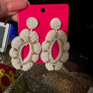 White beaded statement earrings